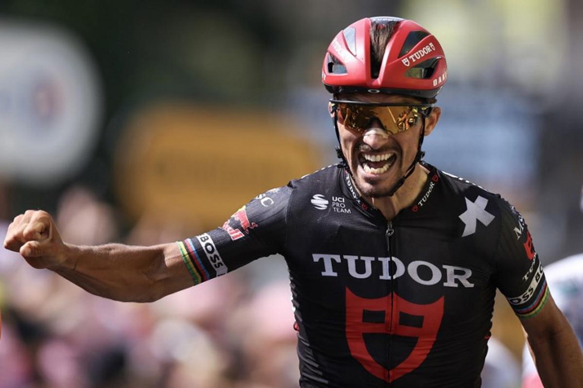 Tudor Pro Cycling Team's French rider Julian Alaphilippe cycles to the finish line to place third in the 15th stage of the 112th edition of the Tour de France cycling race, 169.3 km between Muret and Carcassonne, southwestern France, on July 20, 2025.  Anne-Christine POUJOULAT / AFP