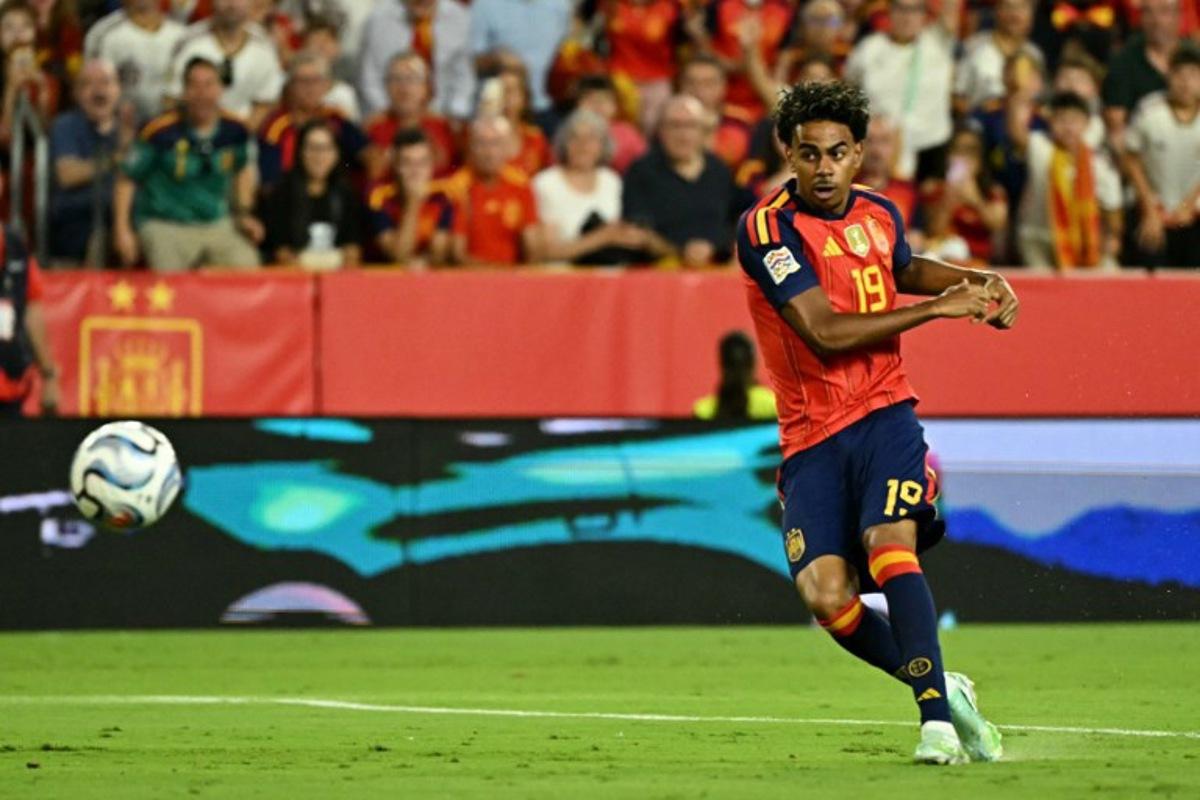 Spain's forward #19 Lamine Yamal shoots to score his team's first goal during the UEFA Nations League league phase group A3 football match between Spain and Croatia at Ramon Sanchez Pizjuan Stadium in Seville on September 29, 2026.  Javier SORIANO / AFP
