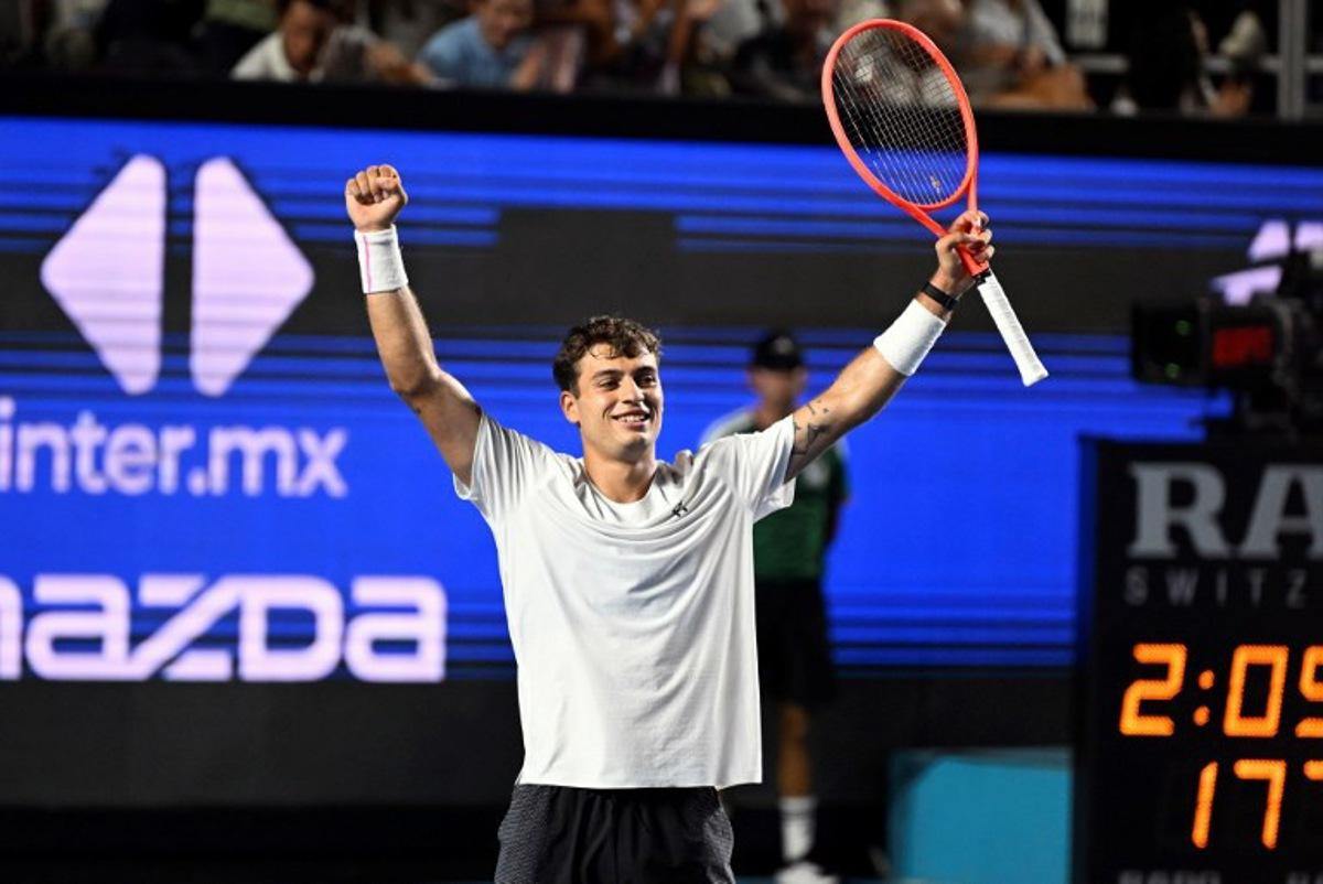 Italy's Flavio Cobolli celebrates his victory against US' Frances Tiafoe during the 2026 Mexico ATP 500 Tennis Open men's singles tennis final match at the Arena GNP Seguros in Acapulco, Guerrero State, Mexico on February 28, 2026.  Alfredo ESTRELLA / AFP