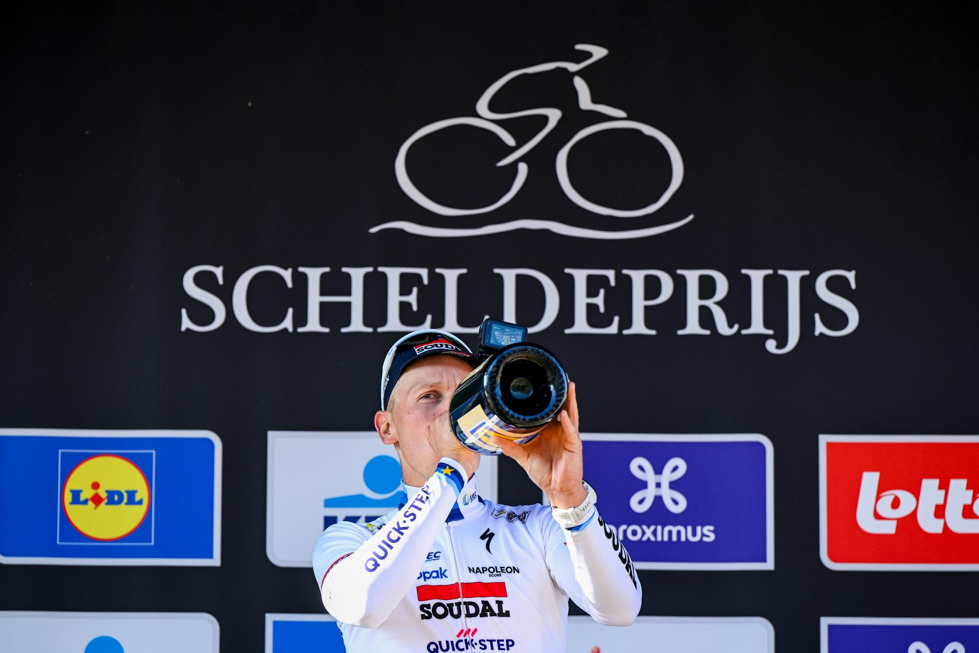 Belgian Tim Merlier of Soudal Quick-Step celebrates on the podium after winning the men's race of the 113th edition of the 'Scheldeprijs' one day cycling event, 202,8 km from Terneuzen, the Netherlands to Schoten, Belgium on Wednesday 09 April 2025. BELGA PHOTO ERIC LALMAND