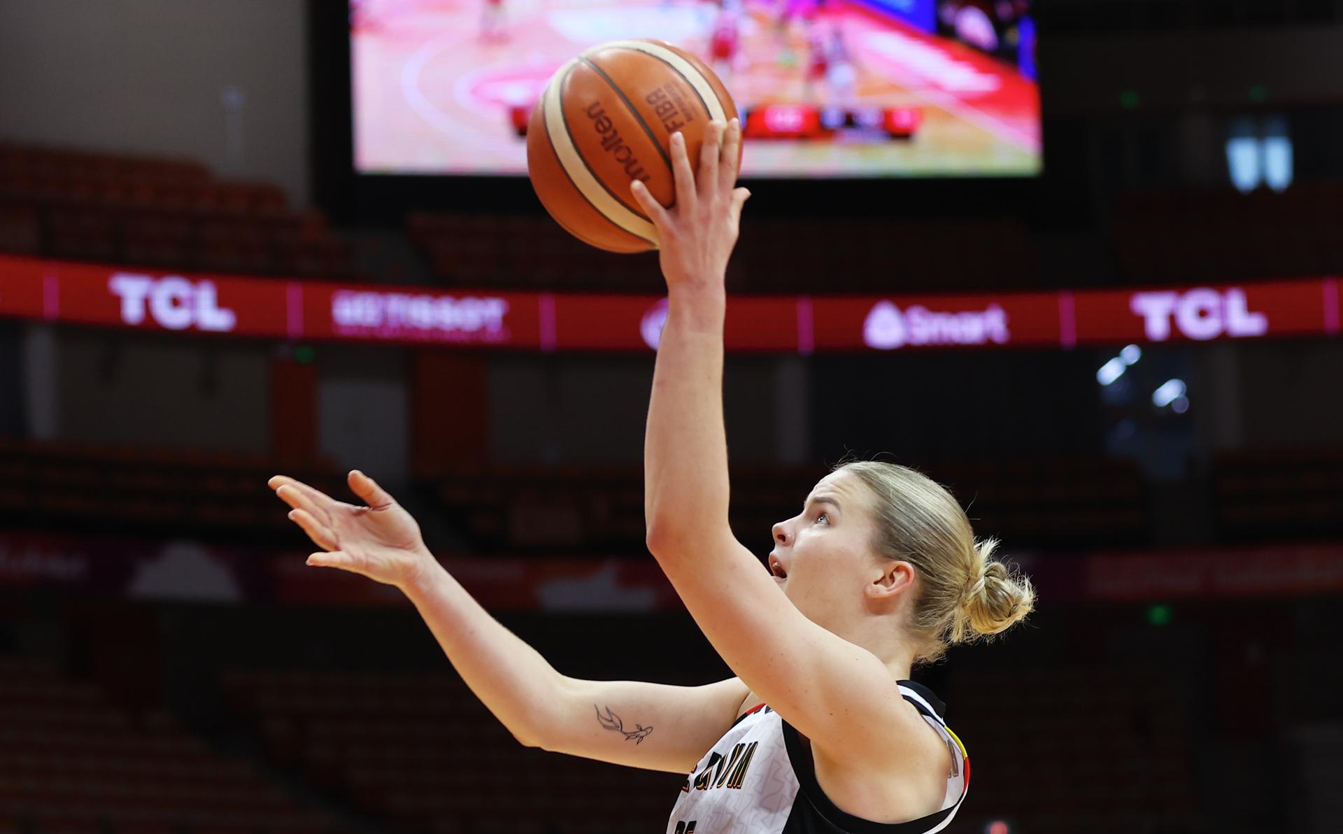 Belgium's Becky Massey fights for the ball during a basket game between Belgium's national team Belgian Cats and Czech Republic, in Wuhan, China, on Tuesday 17 March 2026, the fifth game (out of 5) of the qualifications phase for the World Cup Basket tournament. BELGA PHOTO NIKOLA KRSTIC