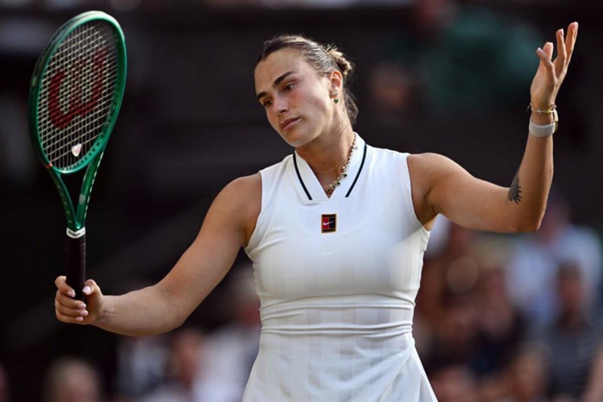 Belarus's Aryna Sabalenka reacts as she plays against Japan's Naomi Osaka during their women's singles round of 16 tennis match on the seventh day of the 2026 Wimbledon Championships at The All England Lawn Tennis and Croquet Club in Wimbledon, southwest London, on July 5, 2026.  Kirill KUDRYAVTSEV / AFP