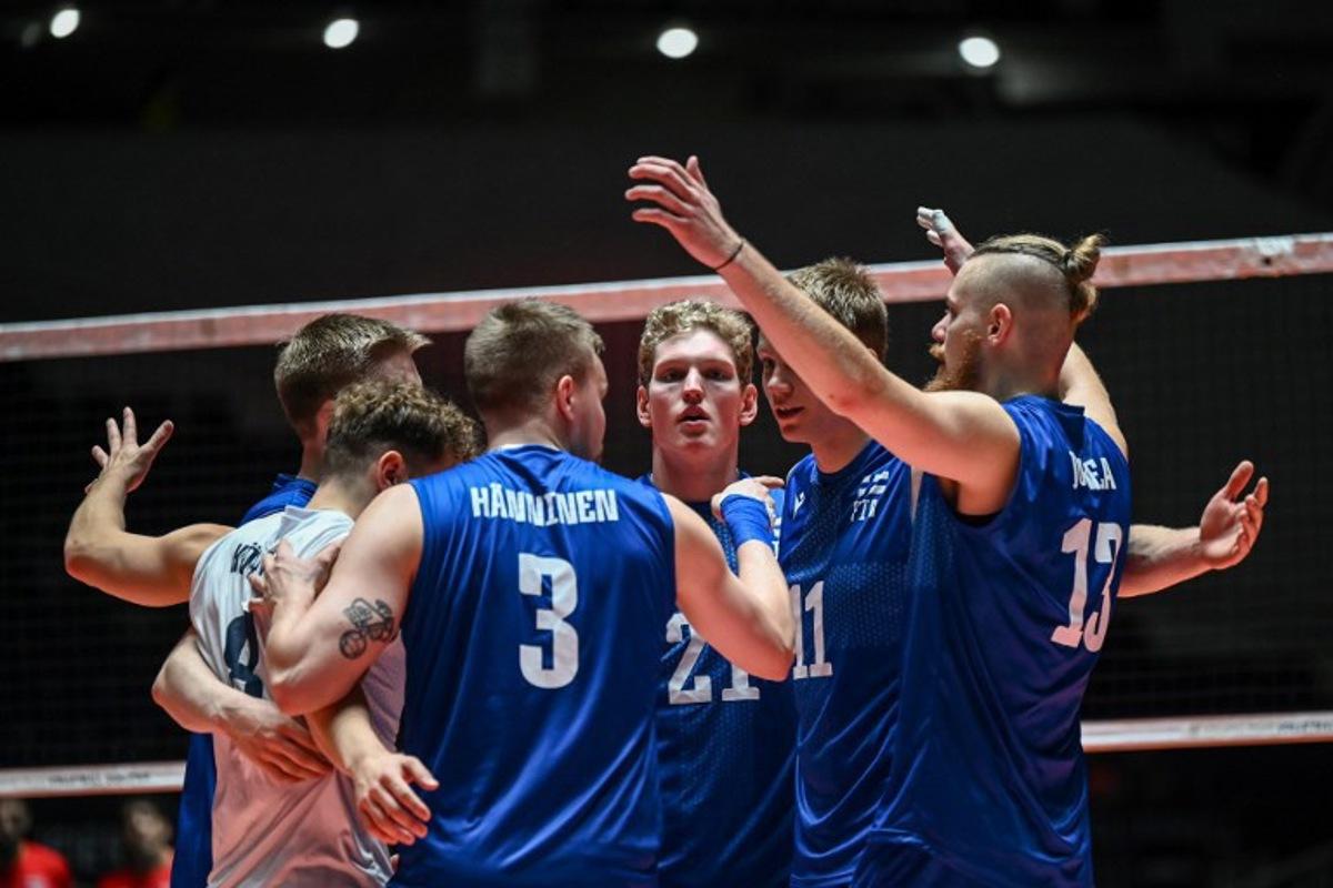Members of Finland celebrate after a point during the match between Finland and Egypt on the final day of the Volleyball World Cup 2023 men's Olympic qualifying tournament at Yoyogi National Stadium in Tokyo on October 8, 2023.  Richard A. Brooks / AFP