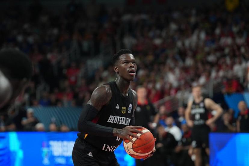 Germany's point guard #17 Dennis Schroder prepares for a throw during the FIBA EuroBasket 2025 final basketball match between Turkey and Germany in Riga, Latvia, on September 12, 2025.  Gints Ivuskans / AFP