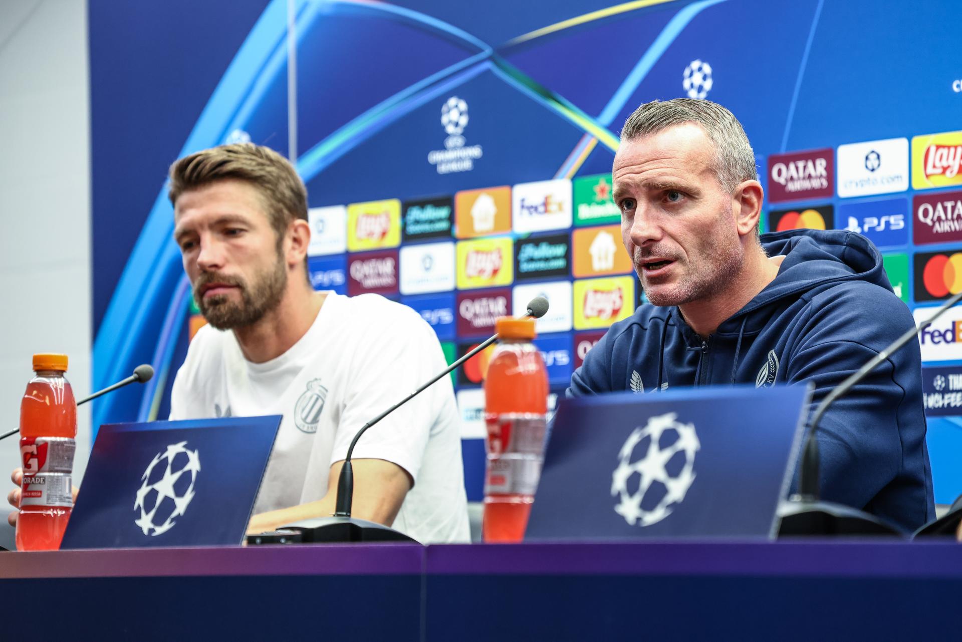Club's Brandon Mechele and Club's head coach Nicky Hayen pictured during a press conference of belgian soccer team Club Brugge, in Brugge, on Tuesday 26 August 2025. The team will play the scottish team Glasgow Rangers on Wednesday, on the second leg of play-offs of the Champions League tournament. BELGA PHOTO BRUNO FAHY