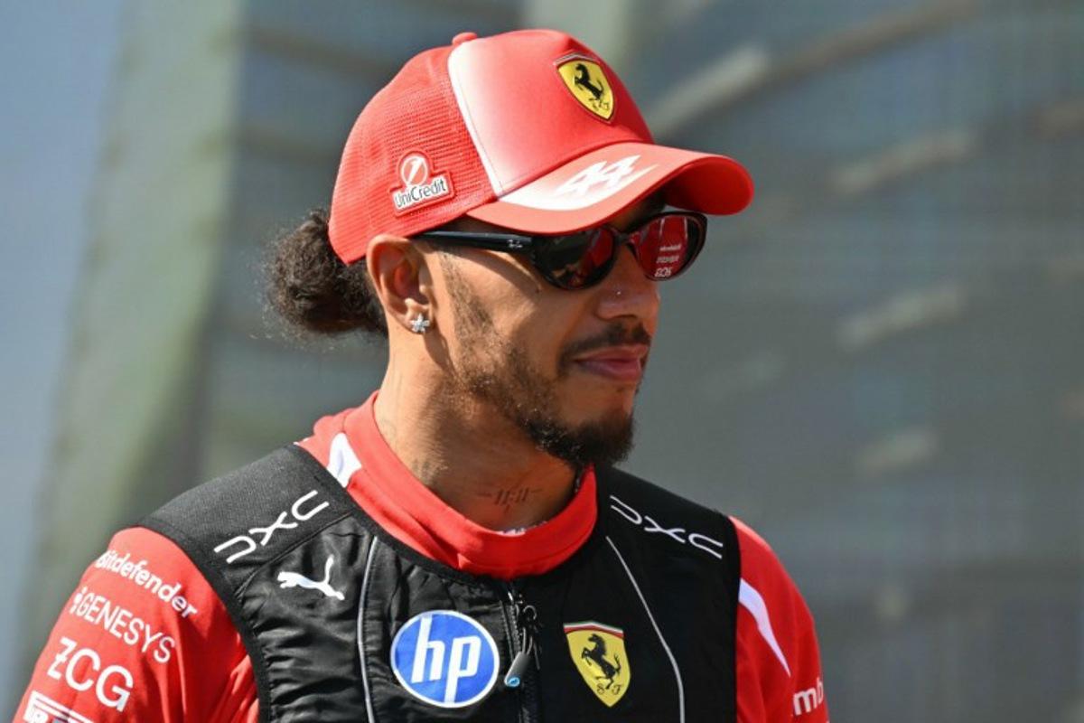 Ferrari's British driver Lewis Hamilton attends the drivers' presentation prior to the Formula One Azerbaijan Grand Prix at the Baku City Circuit in Baku on September 26, 2026.  Andrej ISAKOVIC / AFP