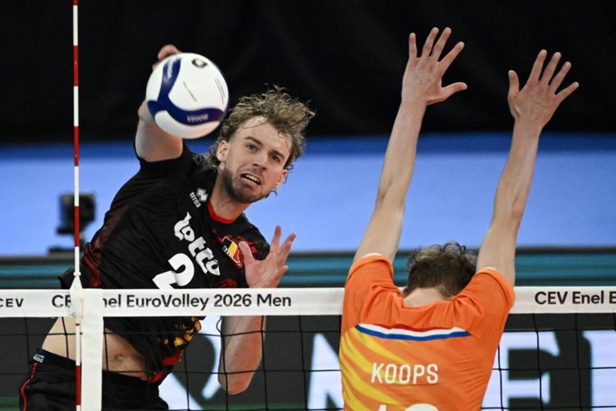 Belgium's Ferre Reggers and Netherlands' Tom Koops play the ball during the men's volleyball European Championships Pool C match Netherland vs Belgium in Tampere, Finland, on September 11, 2026.   Emmi Korhonen / Lehtikuva / AFP