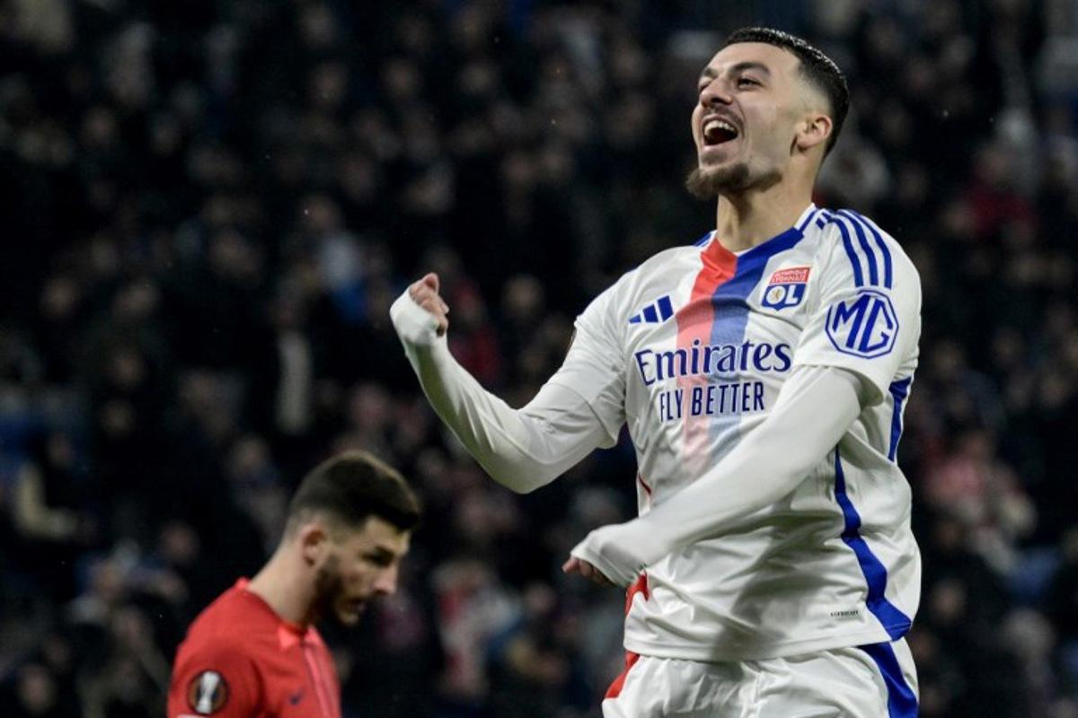 Lyon's Georgian  #69 Georges Mikautadze celebrates scoring his team's third goal during the second leg of last 16 UEFA Europa League football match between Olympique Lyonnais (OL) (FRA) and Steaua Bucharest FCSB (ROM) at the Parc Olympique Lyonnais in Decines-Charpieu, south-eastern France on March 13, 2025.   JEAN-PHILIPPE KSIAZEK / AFP