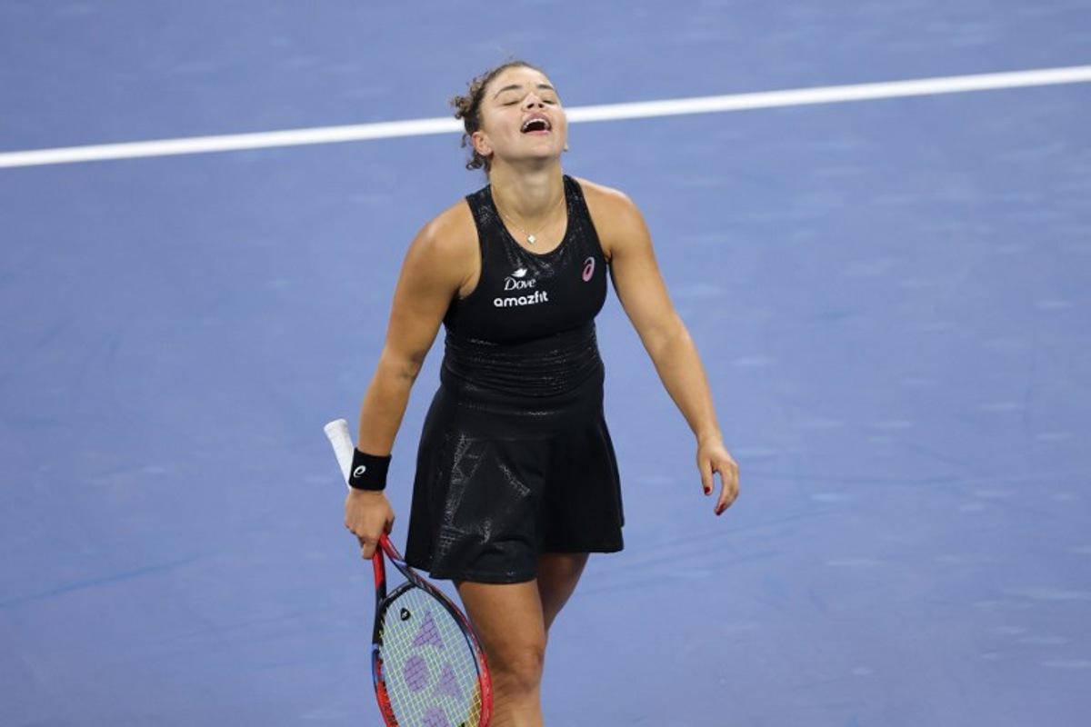 Italy's Jasmine Paolini celebrates after winning her women's singles first round tennis match against Australia's Destanee Aiava on day one of the US Open tennis tournament at the USTA Billie Jean King National Tennis Center in New York City, on August 24, 2025.  CHARLY TRIBALLEAU / AFP