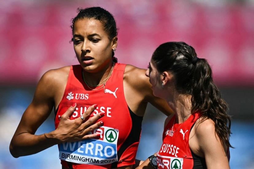 Switzerland's Audrey Werro (L) reacts after competing and falling in the women's 800m semi-final 1 during the European Athletics Championships at Alexander Stadium in Birmingham on August 13, 2026.  Paul ELLIS / AFP