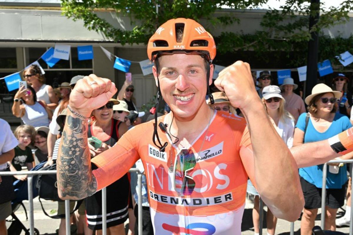 Ineos Grenadiers rider Sam Welsford from Australia celebrates winning stage three of the Tour Down Under UCI Men's Cycling race in Adelaide on January 23, 2026.  Brenton Edwards / AFP