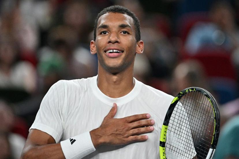 Canada's Felix Auger-Aliassime celebrates after winning against Italy's Lorenzo Musetti during their men's singles match at the Shanghai Masters tennis tournament in Shanghai on October 8, 2025.  Hector RETAMAL / AFP