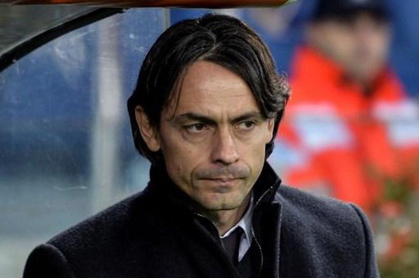 AC Milan's coach Filippo Inzaghi looks on before the match against Lazio for their Italian Serie A football match on 24 January, 2015 at Rome's Olympic stadium. AFP PHOTO / ANDREAS SOLARO