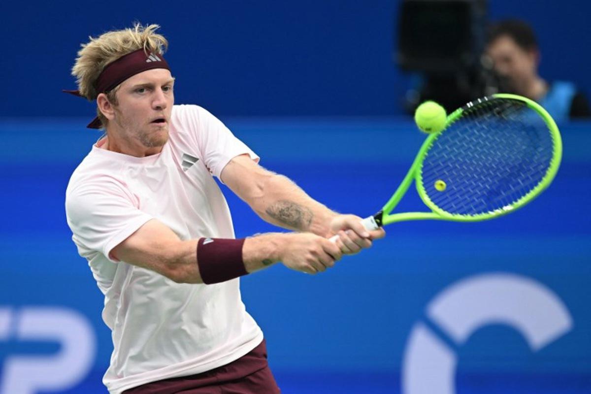 Spain's Alejandro Davidovich Fokina hits a return to Georgia's Nikoloz Basilashvili during their men's singles semi-final match at the Chengdu Open tennis tournament in Chengdu, in China's southwest Sichuan province on September 28, 2026.  AFP