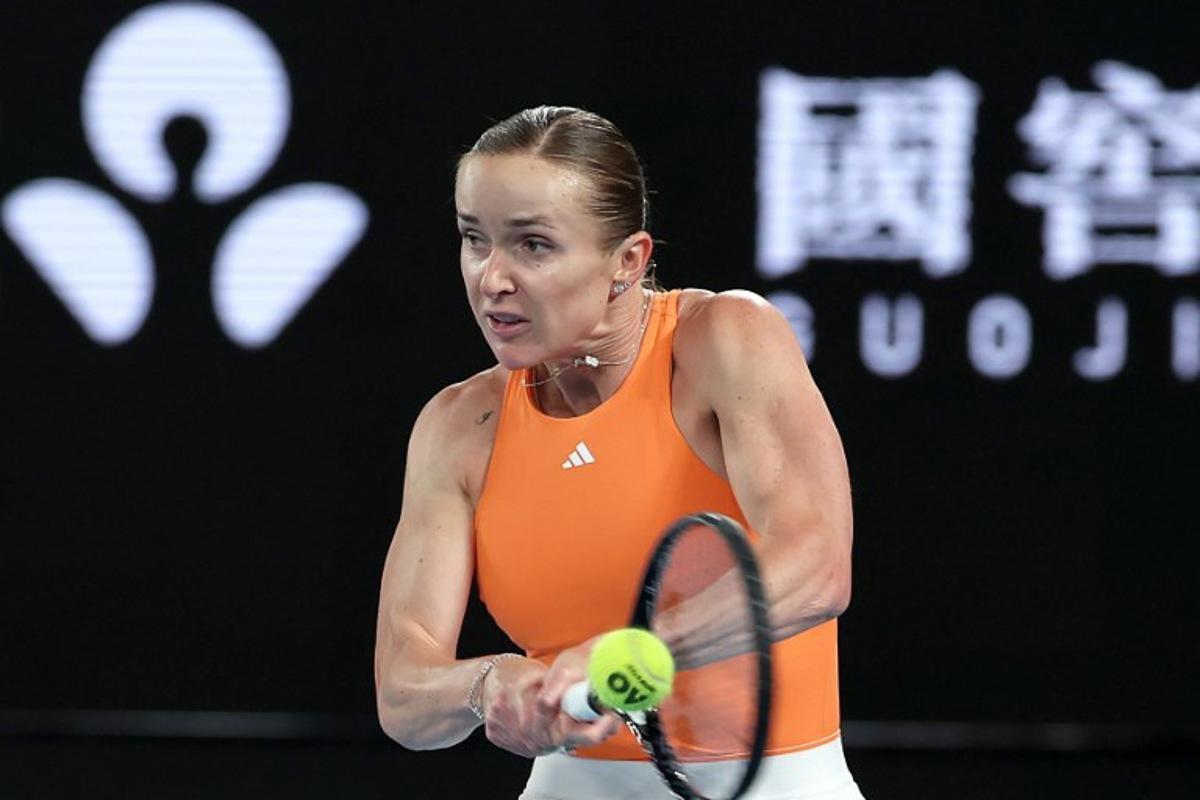 Ukraine's Elina Svitolina hits a return to USA's Coco Gauff during their women's singles quarter-final match on day ten of the Australian Open tennis tournament in Melbourne on January 27, 2026.  Martin KEEP / AFP