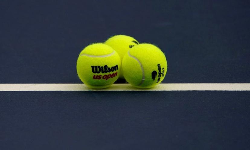 Tennis balls sit on the court during the first round of the 2022 US Open Tennis tournament at the USTA Billie Jean King National Tennis Center in New York, on August 29, 2022.  TIMOTHY A. CLARY / AFP