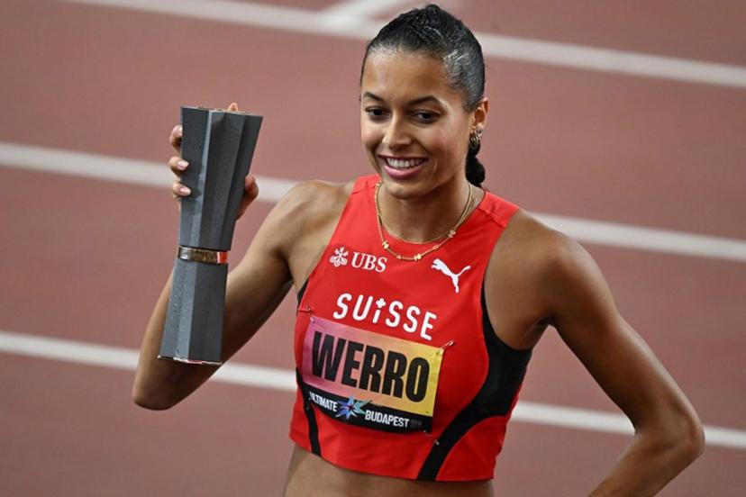 Switzerland's Audrey Werro celebrates with the trophy after winning the women's 800m final during the World Athletics Ultimate Championship at the Gyula Zsivotzky National Athletics Centre, in Budapest on September 12, 2026.  Attila KISBENEDEK / AFP