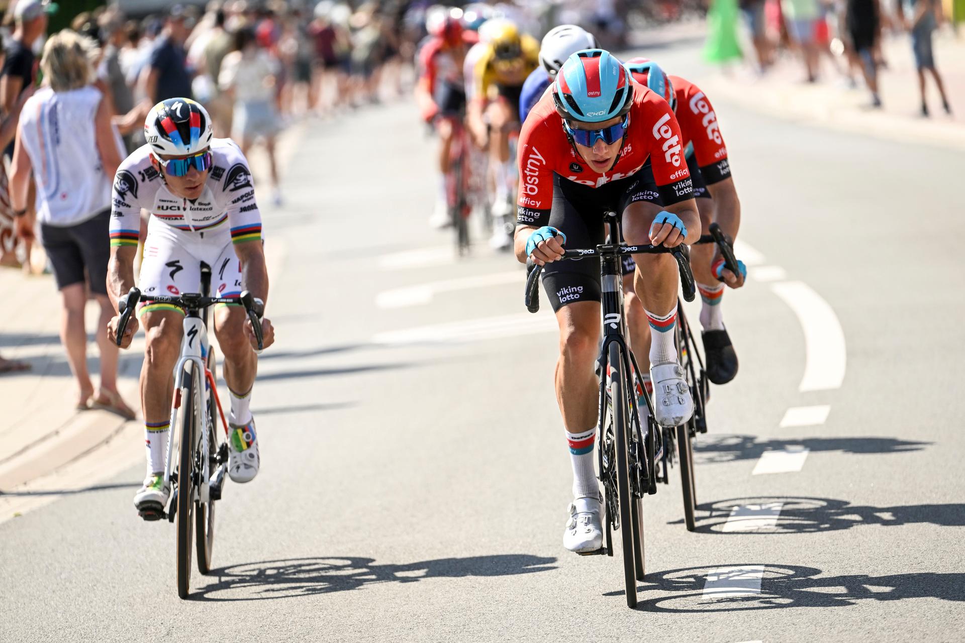 Belgian Alec Segaert of Lotto-Dstny and Belgian World Champion Remco Evenepoel of Soudal Quick-Step pictured in action during the men's elite race of the Belgian Championships cycling, 230,7 km, in Izegem, on Sunday 25 June 2023. BELGA PHOTO POOL NICO VEREECKEN