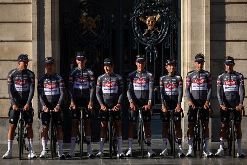 (From L) Alpecin - Deceuninck team's Belgian rider Jonas Rickaert, Alpecin - Deceuninck team's Australian rider Kaden Groves, Alpecin - Deceuninck team's Belgian rider Emiel Verstrynge, Alpecin - Deceuninck team's Belgian rider Jasper Philipsen, Alpecin - Deceuninck team's Dutch rider Mathieu van der Poel, Alpecin - Deceuninck team's Belgian rider Gianni Vermeersch, Alpecin - Deceuninck team's Swiss rider Silvan Dillier and Alpecin - Deceuninck team's Belgian rider Xandro Meurisse pose during the official teams presentation days prior to the start of the 112th edition of the Tour de France cycling race, in Lille, northern France, on July 3, 2025.  Anne-Christine POUJOULAT / AFP