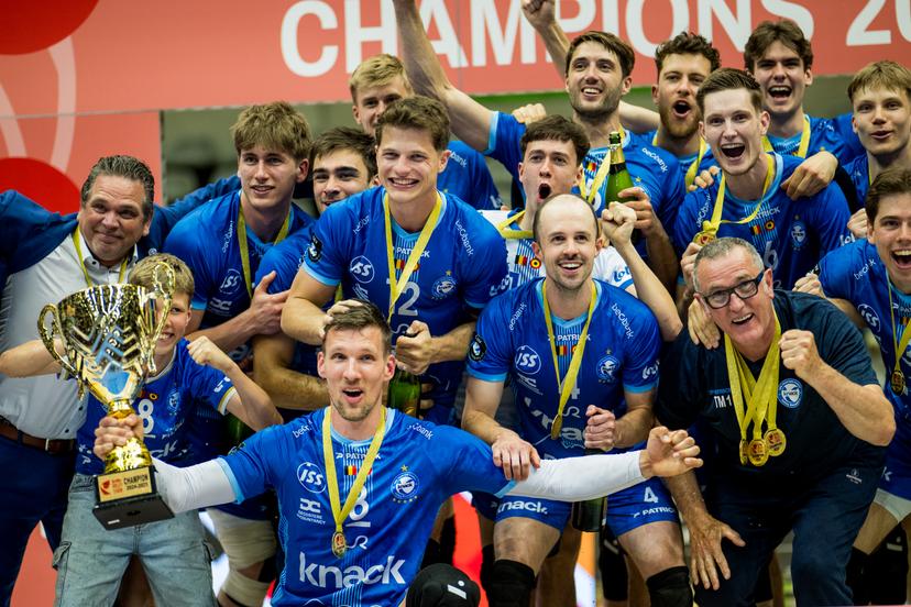 Roeselare's players celebrate after winning the match between Haasrode Leuven and Roeselare, a Play-off Final (4th game, best-of-5) game in the Lotto Volley League Men, Tuesday 13 May 2025 in Leuven. BELGA PHOTO JASPER JACOBS