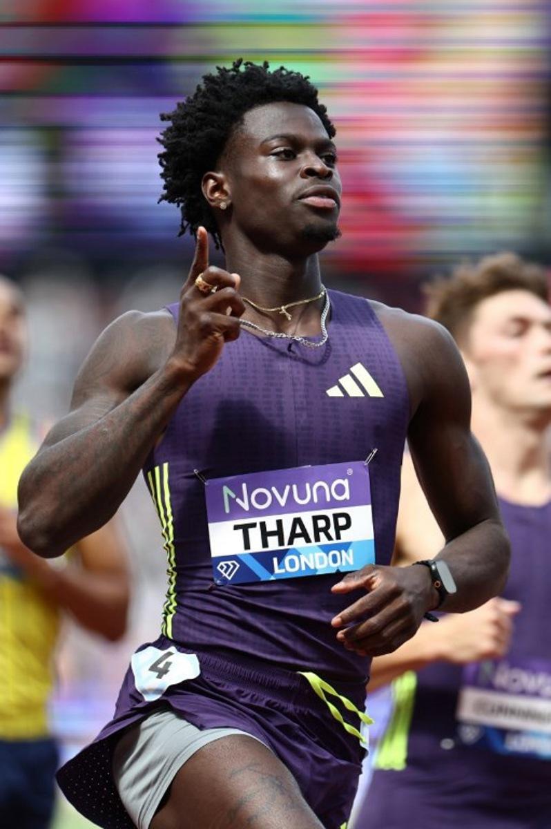 USA's Ja'Kobe Tharp celebrates after crossing the finish line to win the men's 110m hurdles event during the IAAF Diamond League athletics competition at the London stadium in London on July 18, 2026.  Henry NICHOLLS / AFP