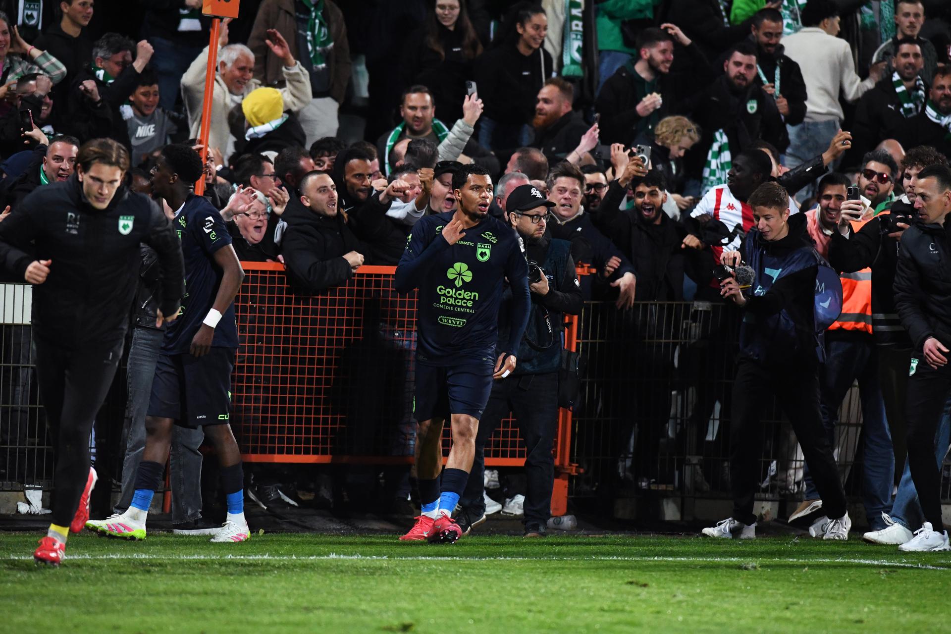 RAAL's Mouhamed Belkeir celebrates after scoring during a soccer game between Lommel SK and RAAL La Louviere, Friday 18 April 2025 in Lommel, on the 30th and last day of the 2024-2025 'Challenger Pro League' 1B second division of the Belgian championship. BELGA PHOTO JILL DELSAUX