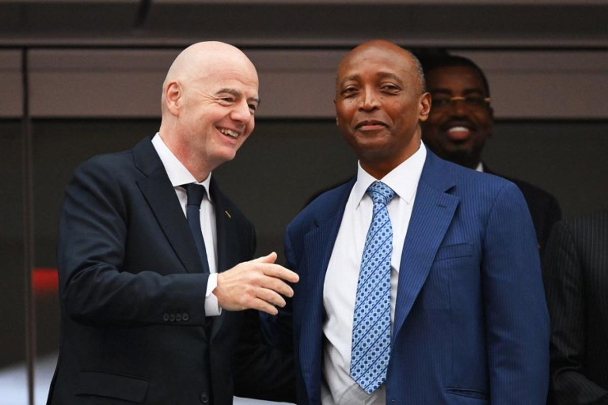 FIFA President Gianni Infantino (L) and Confederation of African Football (CAF) President Patrice Motsepe (R) talk ahead of the 2026 World Cup round of 32 football match between South Africa and Canada at the Los Angeles Stadium in Inglewood on June 28, 2026.   Patrick T. Fallon / AFP