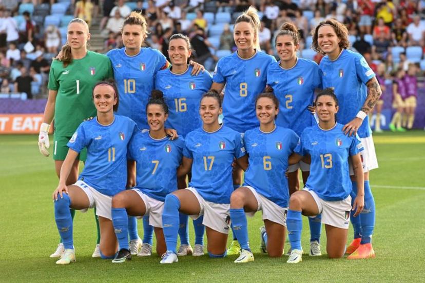 Back row LtoR, Italy's goalkeeper Laura Giuliani, Italy's striker Cristiana Girelli, Italy's defender Lucia di Guglielmo, Italy's midfielder Martina Rosucci, Italy's defender Valentina Bergamaschi and Italy's defender Elena Linari and front row LtoR, Italy's striker Barbara Bonansea, Italy's midfielder Flaminia Simonetti, Italy's defender Lisa Boattin, Italy's midfielder Manuela Giugliano and Italy's defender Elisa Bartoli  pose for a photograph ahead of the UEFA Women's Euro 2022 Group D football match between Italy and Belgium at Manchester City Academy Stadium in Manchester, north-west England on July 18, 2022.  Daniel MIHAILESCU / AFP