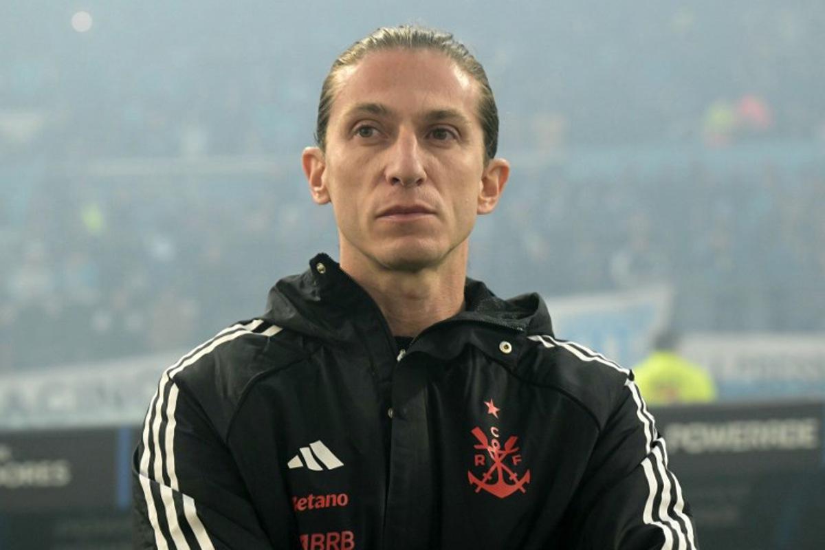 Flamengo's head coach Filipe Luis looks on ahead of the Copa Libertadores semifinal second leg football match between Argentina's Racing and Brazil's Flamengo at the Presidente Juan Domingo Peron - El Cilindro stadium in Avellaneda, Buenos Aires province, on October 29, 2025.  JUAN MABROMATA / AFP