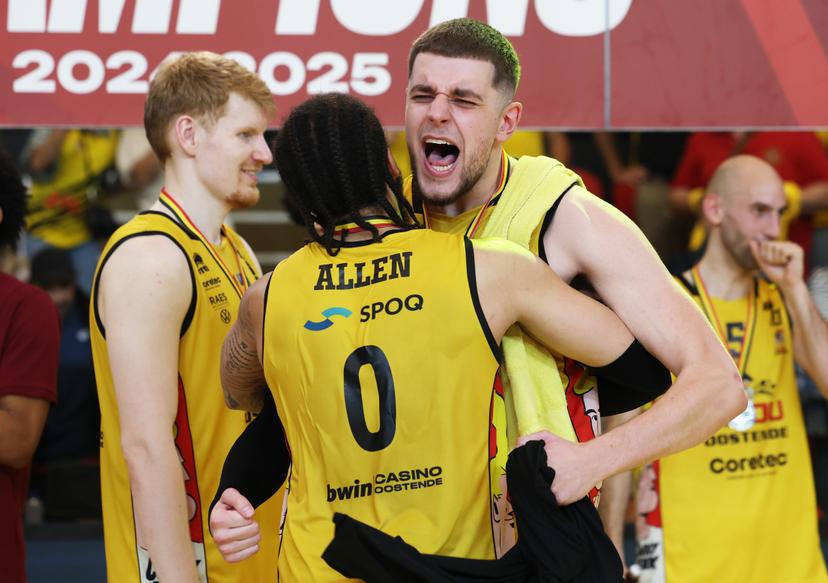 Oostende's Timmy Allen and Oostende's Haris Bratanovic celebrate after winning the Belgian BNXT championship, Saturday 07 June 2025 in Oostende. BC Oostende defeats Kangoeroes Mechelen 100-76 in the fourth game of the best-of-5 finals in the playoffs of the 'BNXT League' Belgian/ Dutch first division basket championship.  BELGA PHOTO KURT DESPLENTER
