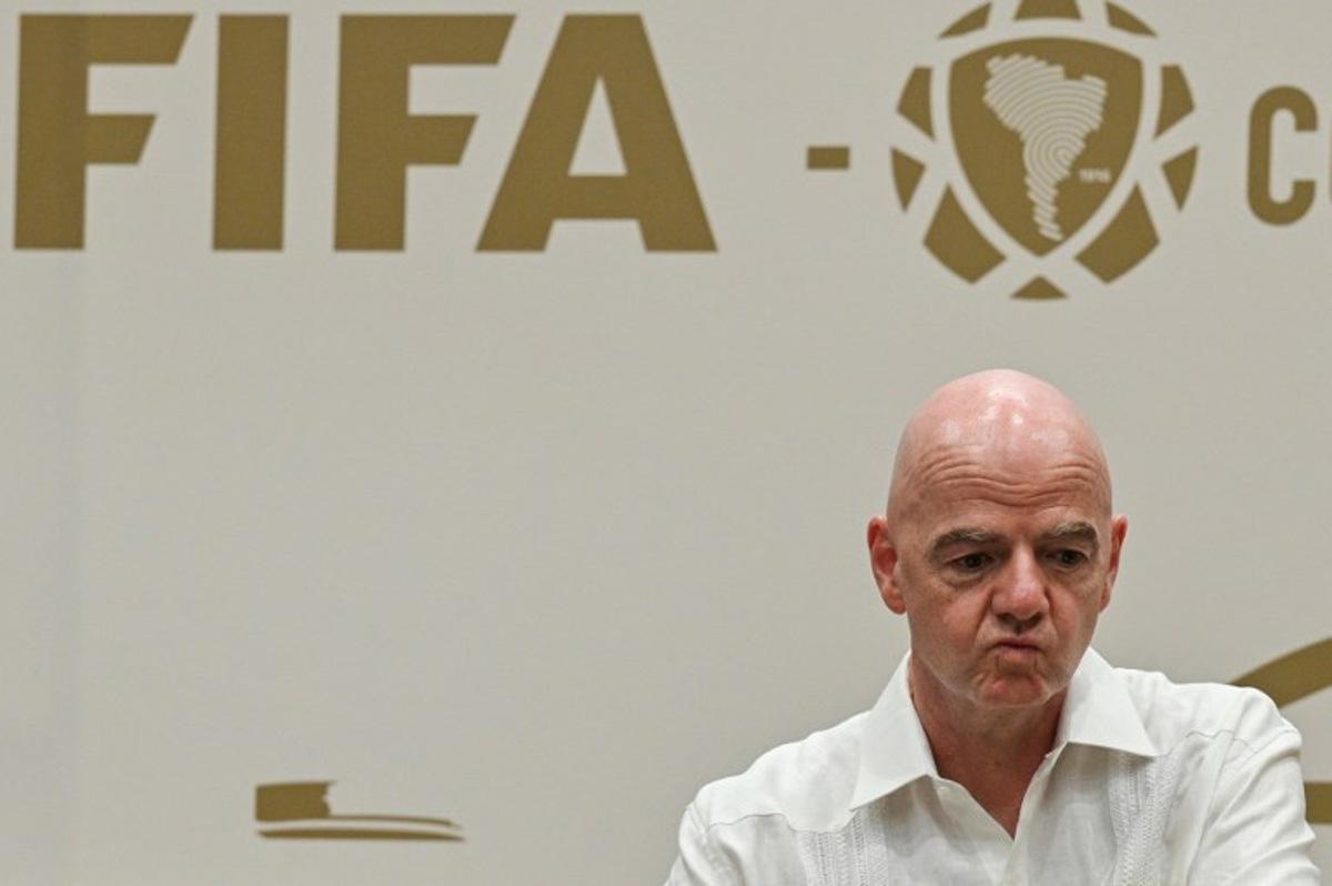 FIFA President Gianni Infantino gestures during his visit to the new Concentration Hotel of the Colombian Football Federation in Barranquilla, Colombia, on February 24, 2026. FIFA boss Gianni Infantino told AFP on February 24, 2026, he was "very reassured" about Mexico's hosting of games in the World Cup, in his first comments on the violence triggered by the killing of a drug cartel leader. David SALAZAR / AFP