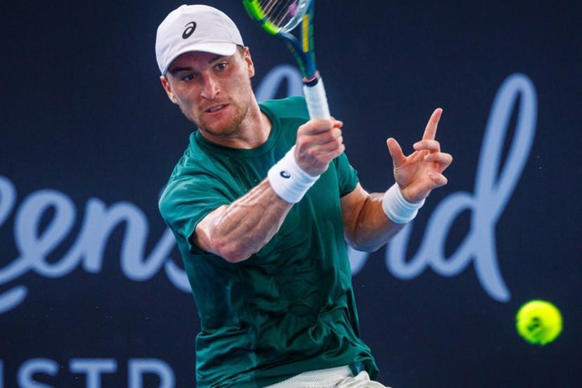 Belgium's Raphael Collignon hits a forehand during the men's singles match against Canada's Denis Shapovalov at the Brisbane International tennis tournament in Patrick Rafter Tennis Centre in Brisbane on January 6, 2026.   Patrick HAMILTON / AFP PHOTO / AFP