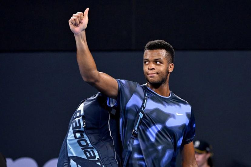 France's Giovanni Mpetshi Perricard walks off court after his defeat against USA's Reilly Opelka in their men's singles semi-final match at the Brisbane International tennis tournament in Brisbane on January 4, 2025.  William WEST / AFP