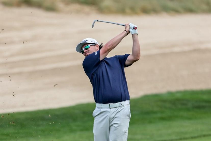 Scotland's Ewen Ferguson plays a shot on day four of the Dubai Desert Classic 2025 golf tournament at the Emirates Golf Club in Dubai on January 19, 2025.  FADEL SENNA / AFP