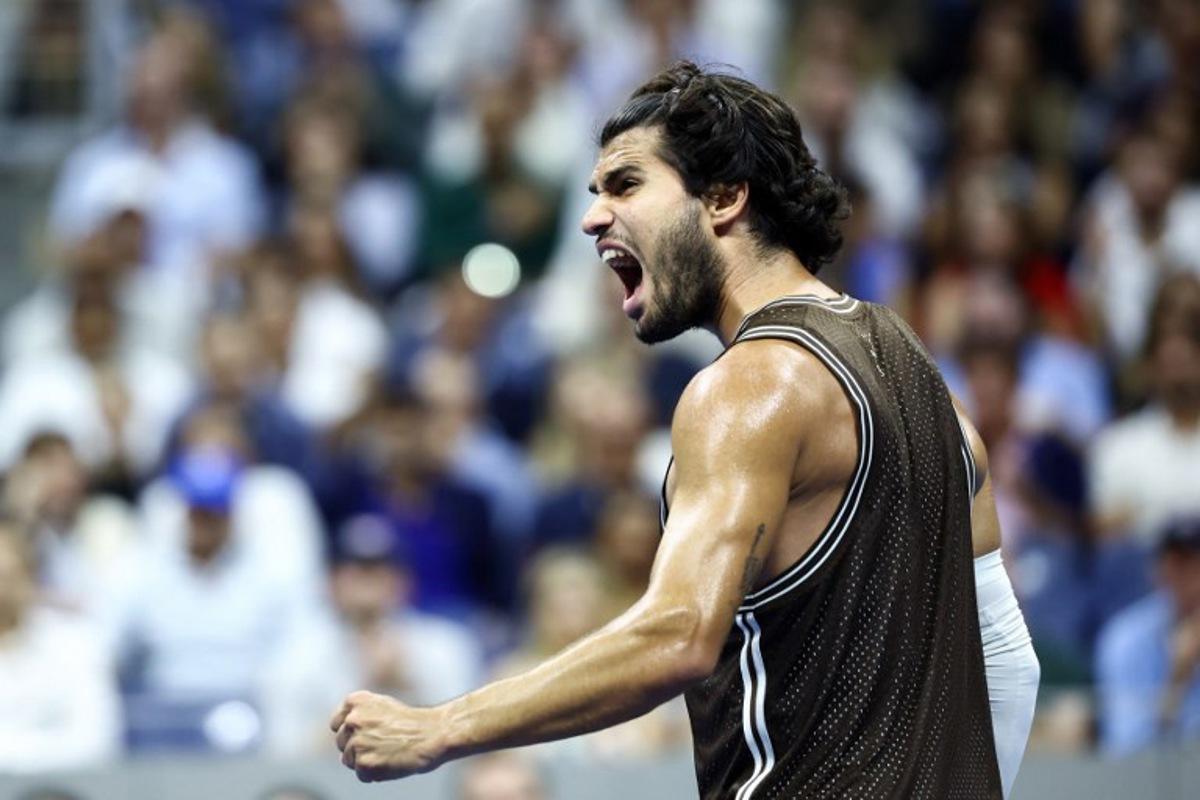 Spain's Carlos Alcaraz celebrates a point during the men's singles second round tennis match against Portugal's Jaime Faria on day four of the US Open tennis tournament at the USTA Billie Jean King National Tennis Center in New York City on September 2, 2026.  CHARLY TRIBALLEAU / AFP