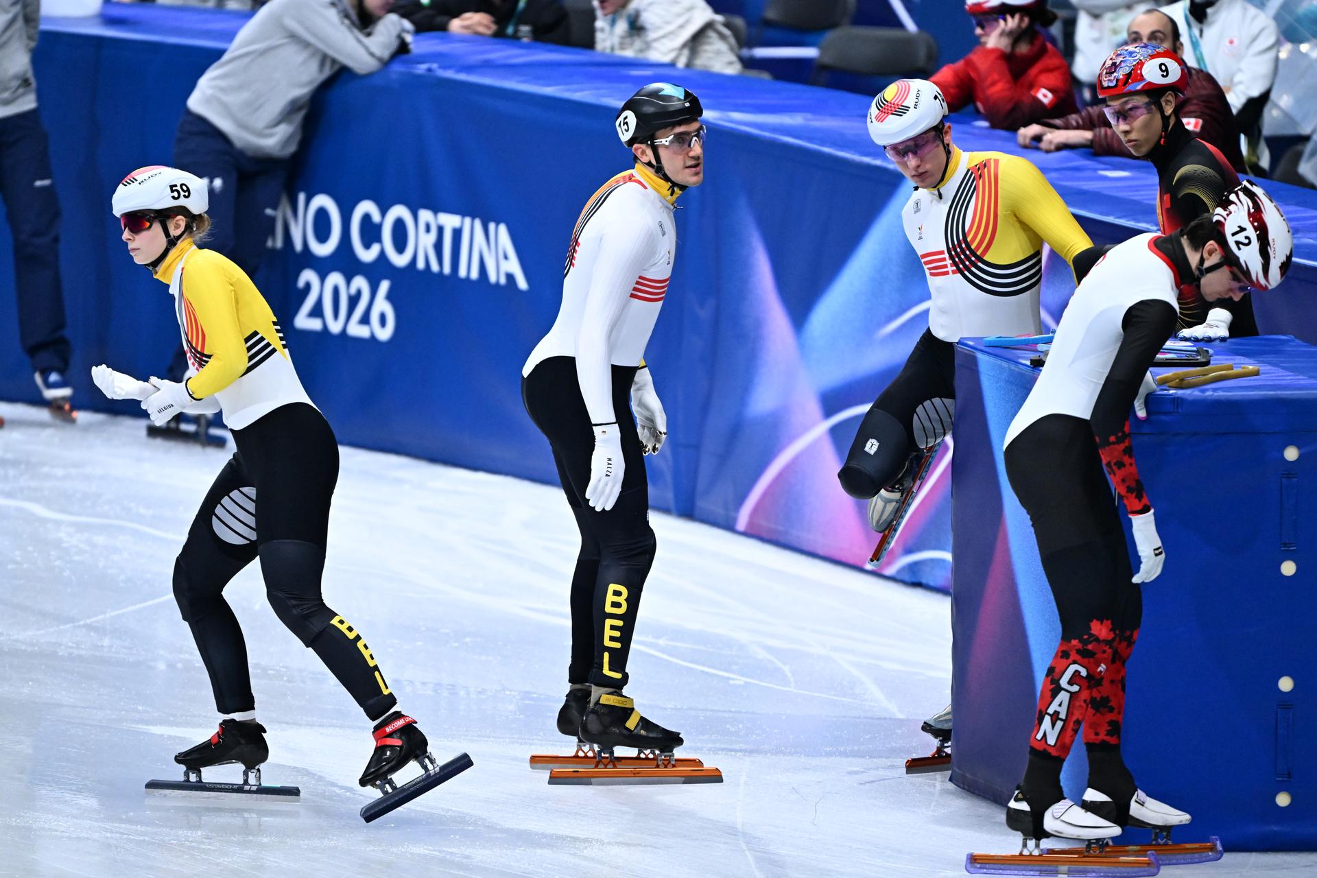 Belgian shorttrack skater Tineke den Dulk, Belgian shorttrack skater Stijn Desmet and Belgian shorttrack skater Ward Petre pictured during the quarterfinals of the Mixed Team Relay of the Short Track Speed Skating competition at the Milano Cortina 2026 Olympic Winter Games, on Tuesday 10 February 2026 in Milan, Italy. The XXV Winter Olympics take place from 6 to 22 February 2026 in Italy. BELGA PHOTO JASPER JACOBS
