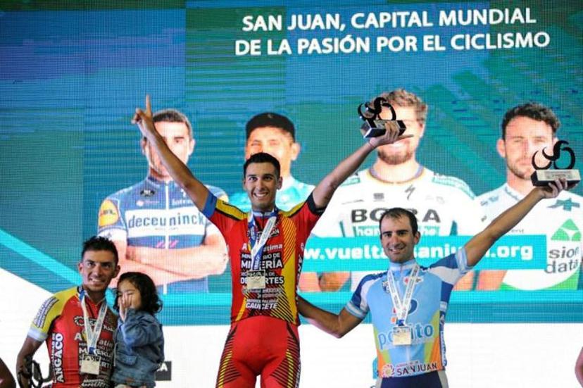 (L to R) Argentinian cyclists Daniel Zamora (AVF), German Nicolas Tivani (AVF) and Daniel Diaz (EMP) celebrate on the podium at the end of the Vuelta a San Juan Internacional 2019, 6th stage, San Juan - Villicum, in San Juan, Argentina, on February 02, 2019.  Andres Larrovere / AFP