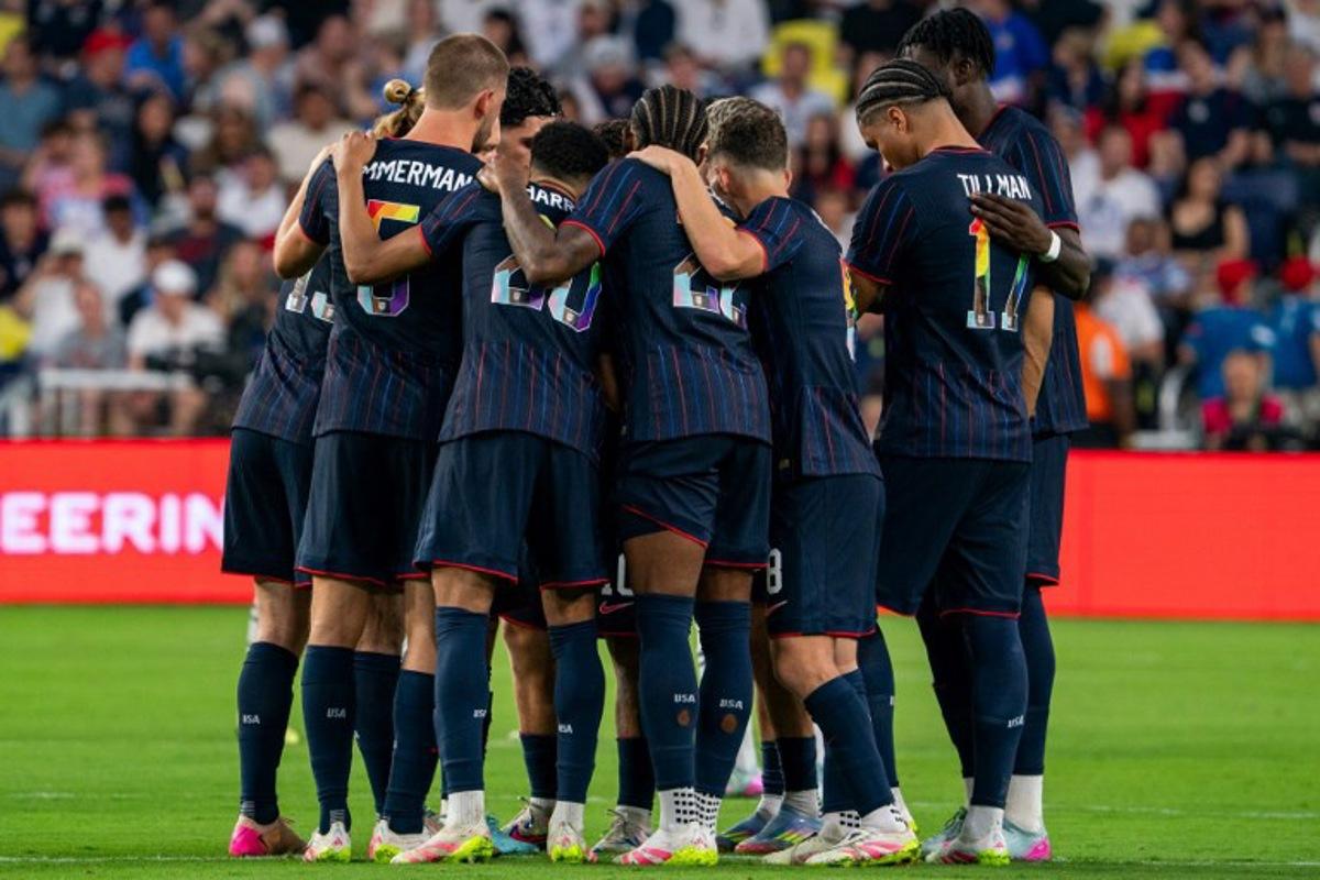 USA players huddle before the start of the second half during an international friendly football match between the USA and Switzerland at Geodis Park in Nashville, Tennessee, on June 10, 2025.   Seth Herald / AFP