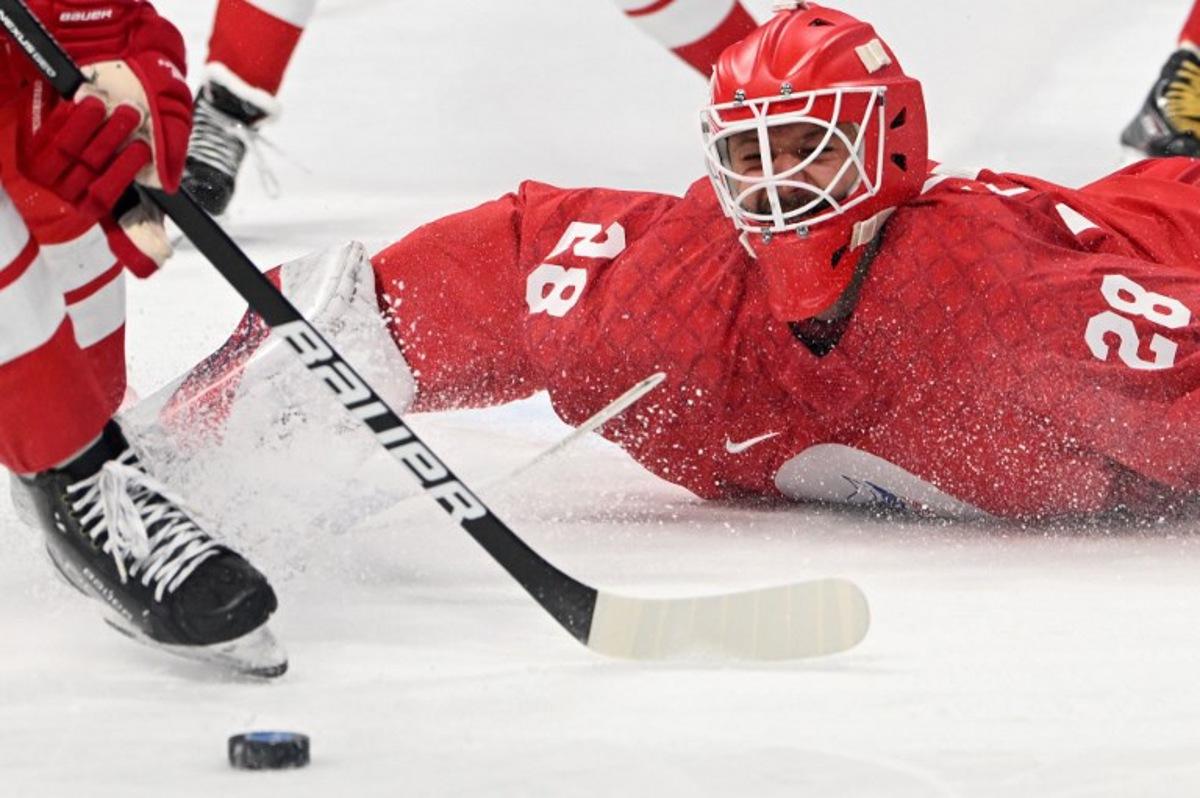 Russian Olympic Committee's goaltender Ivan Fedotov in action during the men's play-off quarterfinal match of the Beijing 2022 Winter Olympic Games ice hockey competition between the Russian Olympic Committee and Denmark, at the Wukesong Sports Centre in Beijing on February 16, 2022. Russian hockey star Ivan Fedotov has been detained for allegedly trying to dodge military service and sent to the country's Far North to serve, Russian media reported on July 4, 2022. One-year military service is mandatory in Russia but is relatively unpopular, and many now fear it due to the prospect of being sent to Ukraine.  Kirill KUDRYAVTSEV / AFP