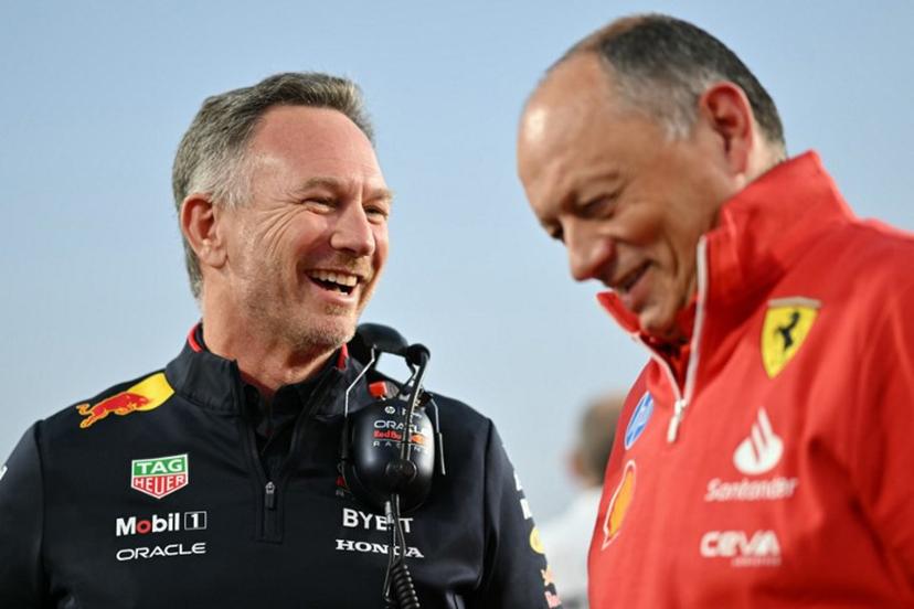 Red Bull Racing's British team principal and CEO Christian Horner (L) and Ferrari's French team principal Frédéric Vasseur talk at the grid before the sprint race ahead of the Qatari Formula One Grand Prix at the Lusail International Circuit in Lusail, north of Doha, on November 30, 2024.  Andrej ISAKOVIC / AFP