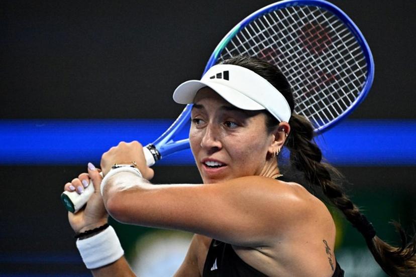 USA's Jessica Pegula hits a return to Ukraine's Marta Kostyuk during their women's singles match at the China Open tennis tournament in Beijing on October 1, 2025.  Pedro Pardo / AFP