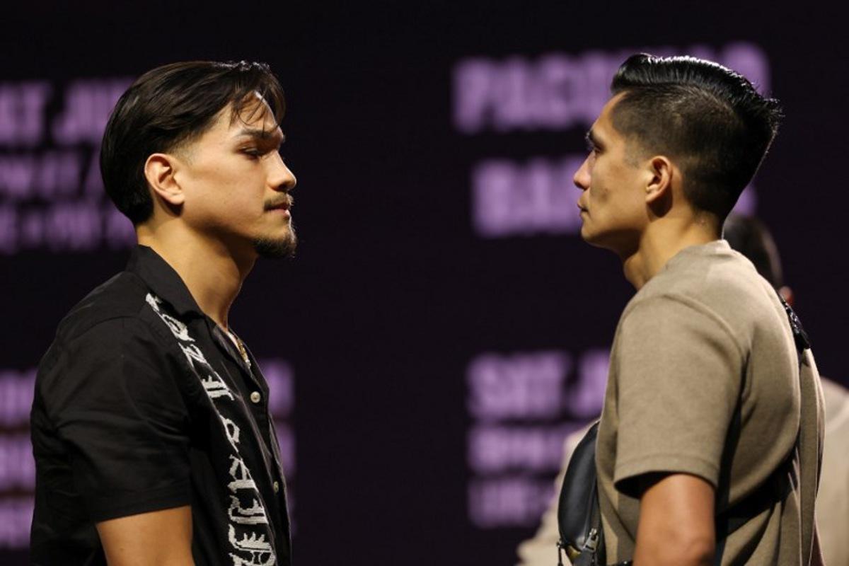 US boxers Brandon Figueroa (L) and Joet Gonzalez (R) face off during the press conference ahead of their July 19 WBC featherweight title fight at the NOVO at L.A. Live in Los Angeles on June 3, 2025.  Patrick T. Fallon / AFP