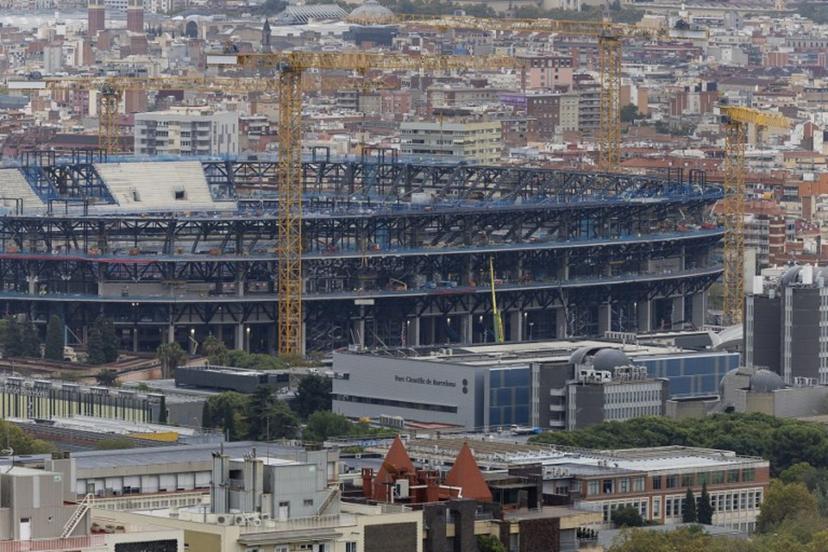 Cranes are pictured as construction continues on the FC Barcelona's Camp Nou Stadium in Barcelona on October 29, 2025.  Josep LAGO / AFP