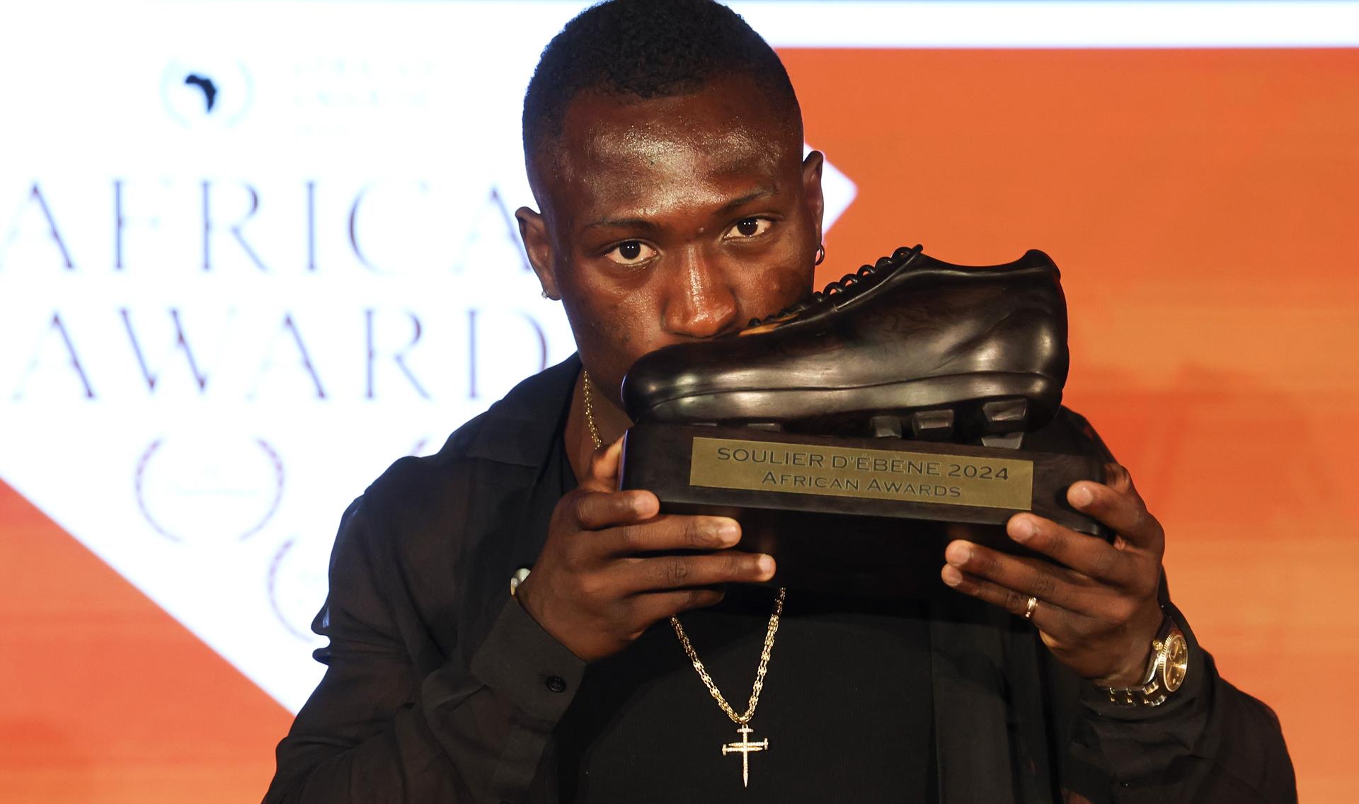 Cercle's Kevin Denkey celebrates after winning the 2024 edition of the 'Gala of the Ebony Shoe' soccer trophy in Brussels, Monday 13 May 2024. The Ebony Shoe award is given to the best African player or player of African descend in the Jupiler Pro League Belgian first division soccer competition. BELGA PHOTO VIRGINIE LEFOUR