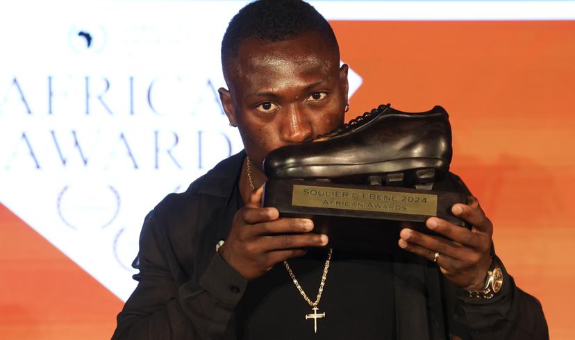 Cercle's Kevin Denkey celebrates after winning the 2024 edition of the 'Gala of the Ebony Shoe' soccer trophy in Brussels, Monday 13 May 2024. The Ebony Shoe award is given to the best African player or player of African descend in the Jupiler Pro League Belgian first division soccer competition. BELGA PHOTO VIRGINIE LEFOUR