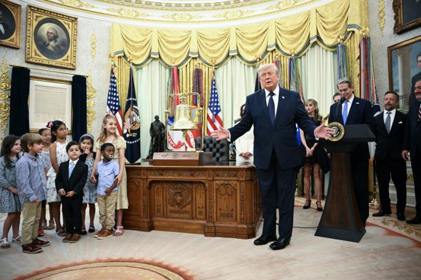 US President Donald Trump (R) speaks at the launch of Trump investment accounts in the Oval Office of the White House in Washington, DC, on July 6, 2026. Trump accounts are a new type of tax-deferred investment accounts for children. Mandel NGAN / AFP