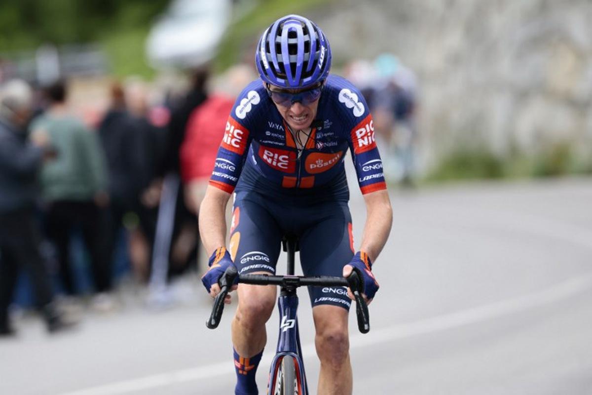 Team Picnic PostNL's French rider Romain Bardet rides in the lead as he climbs Le Motte during the 17th stage of the 108th Giro d'Italia cycling race, 155kms from San Michele all'Adige to Bormio, on May 28, 2025.   Luca Bettini / AFP