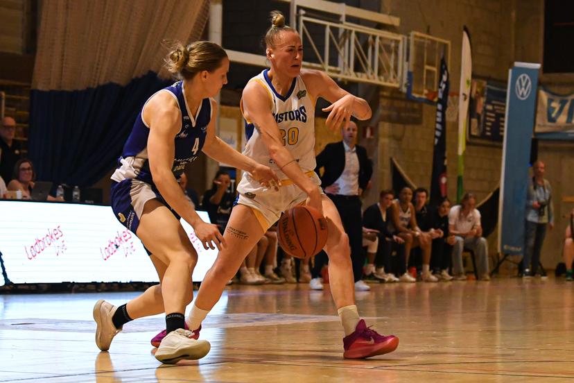 Mechelen's Renee Denys and Castors' Santa Okockyte pictured in action during a basketball match between Royal Castors Braine and Kangoeroes Mechelen, Tuesday 22 April 2025, in Braine-l'Alleud, a 3rd leg best-of-3 game in the play-offs finals of the Women's Top Division Belgian basketball competition. BELGA PHOTO JILL DELSAUX