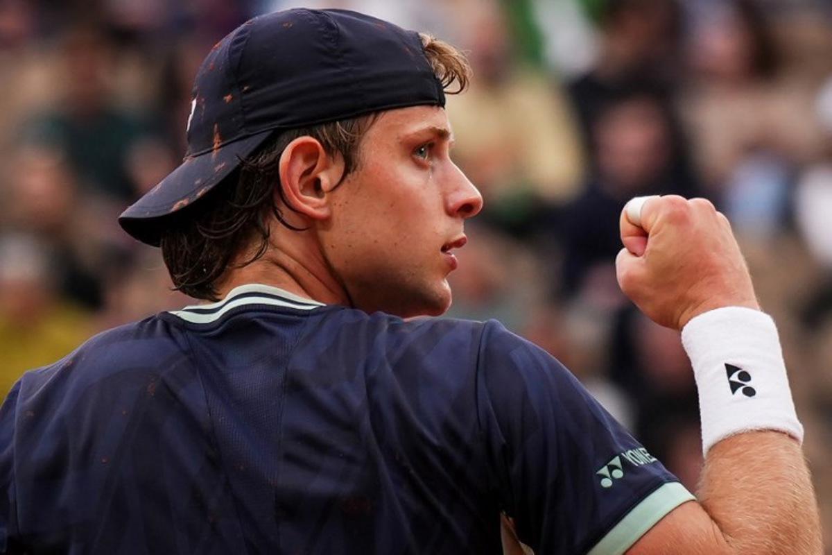 Belgium's Zizou Bergs reacts during his men's singles match against France's Giovanni Mpetshi Perricard on day 1 of the French Open tennis tournament on Court Suzanne-Lenglen at the Roland-Garros Complex in Paris on May 25, 2025.  Dimitar DILKOFF / AFP