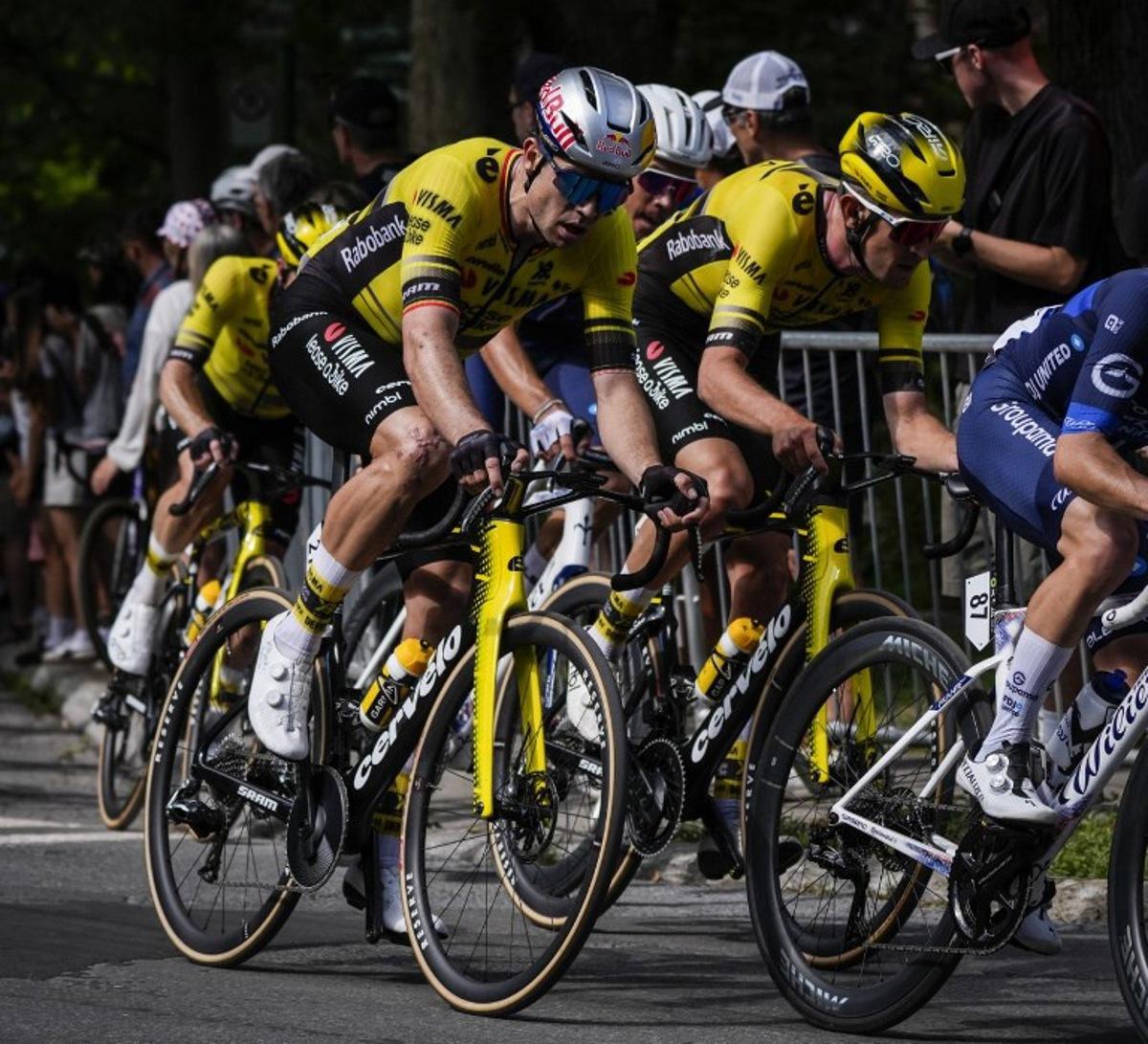 Belgium's Wout van Aert, with Team Visma-Lease a Bike, cycles during the 14th Grand Prix Cycliste de Montreal cycling road race in Montreal, Canada, on September 14, 2025.   MATHIEU BELANGER / AFP